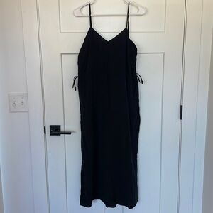 Black, midi dress with pockets.